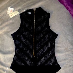 See through black bodysuit.